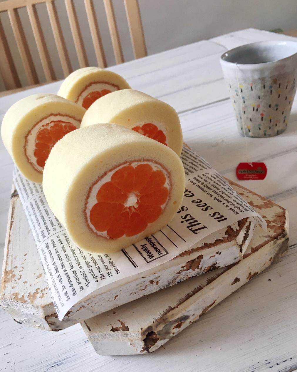 腾子加001做的半个桔子卷(蜂蜜蛋糕体)