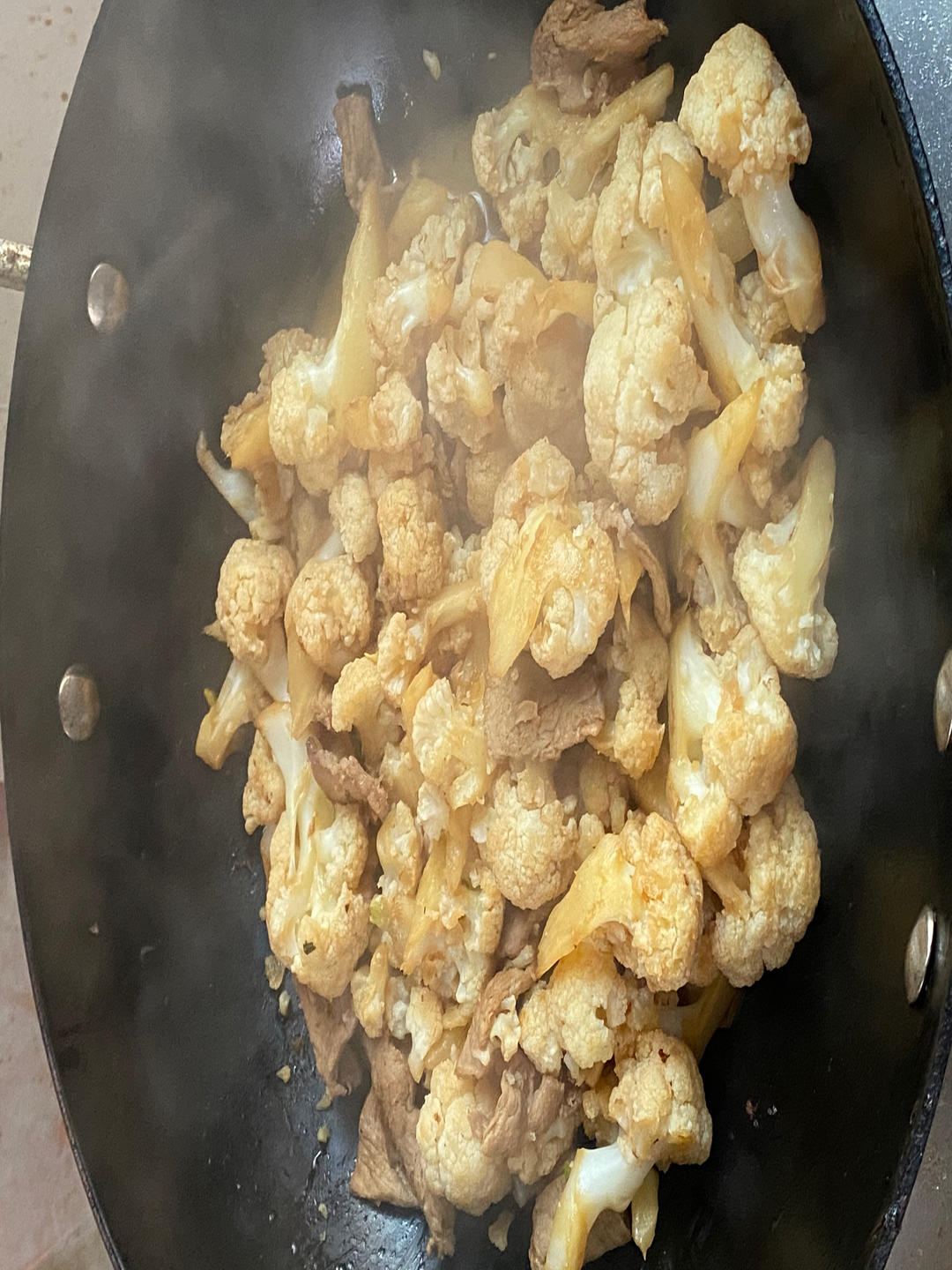 五花肉炒花菜