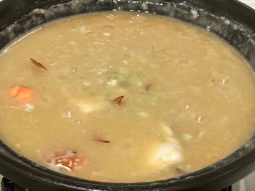 砂锅海鲜粥的做法 步骤13