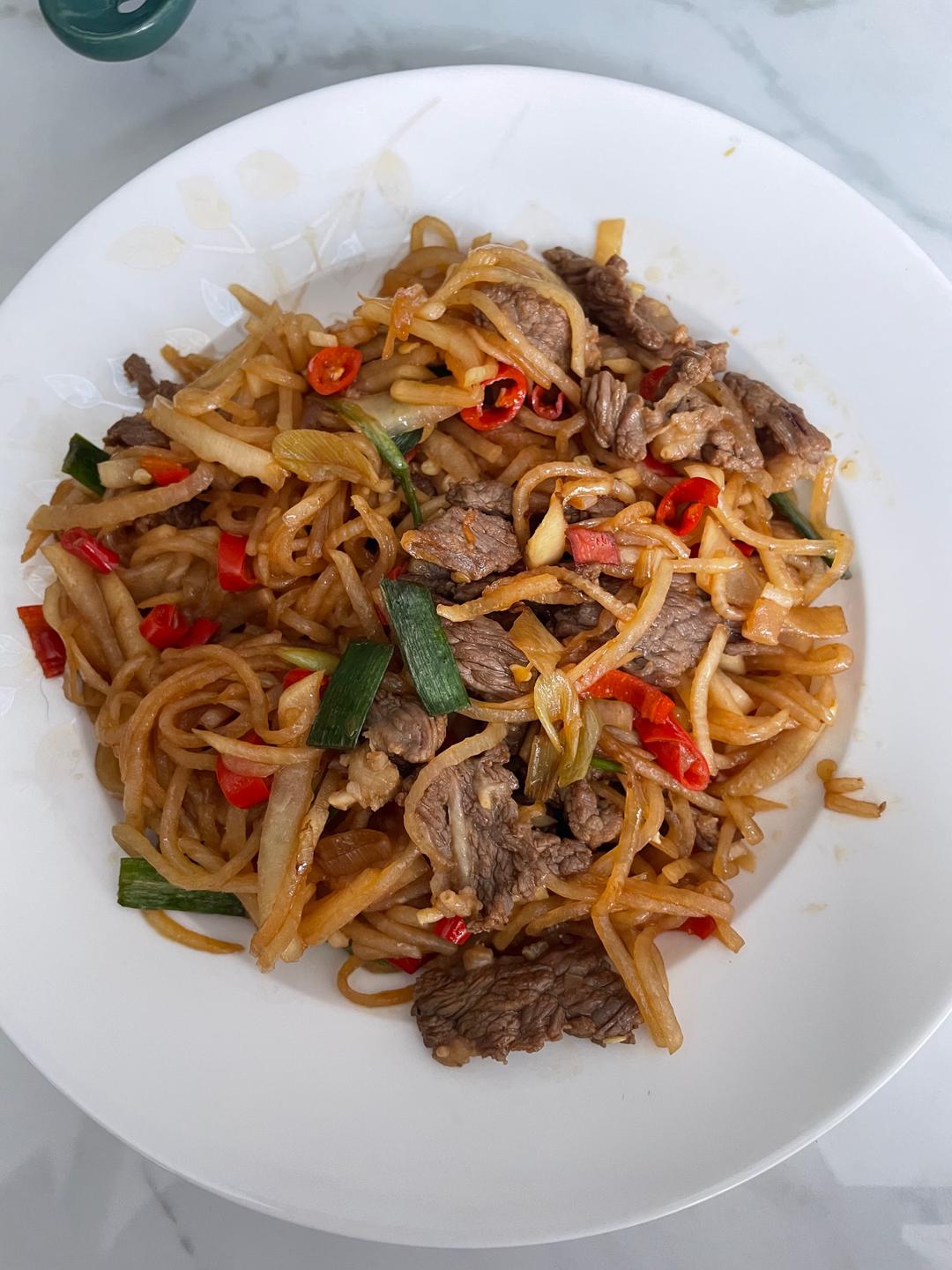 酸萝卜丝炒牛肉的做法 步骤7