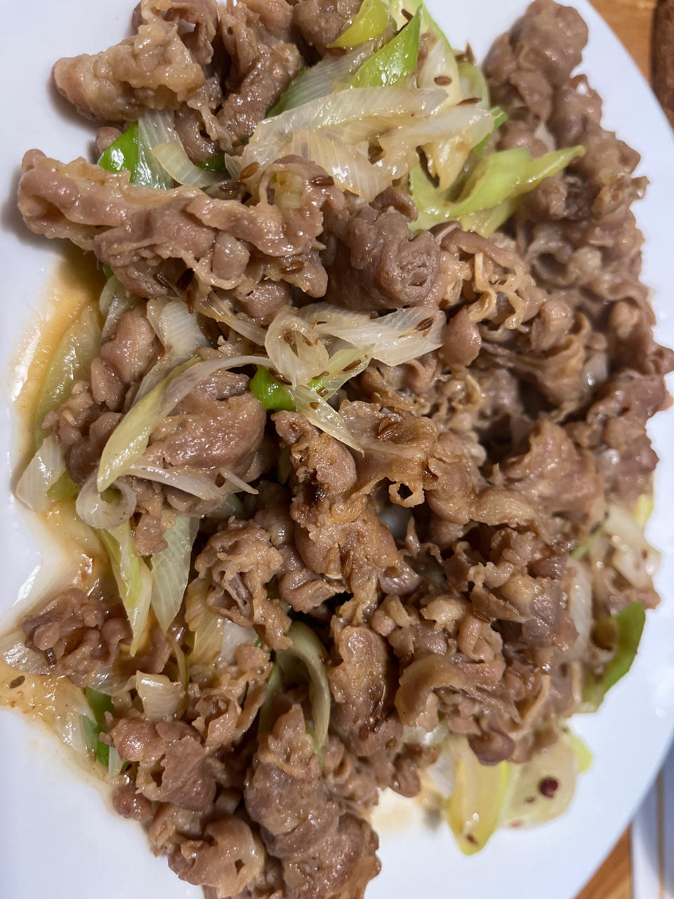 炒了20多年的葱爆羊肉