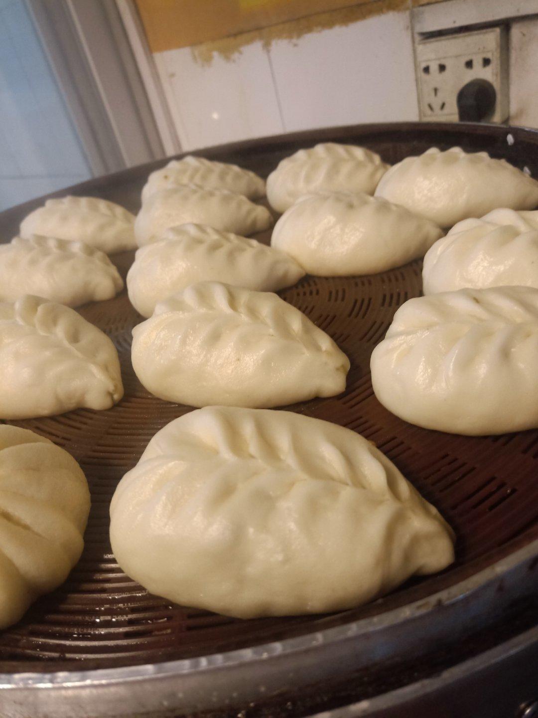 弯柳叶包子包法