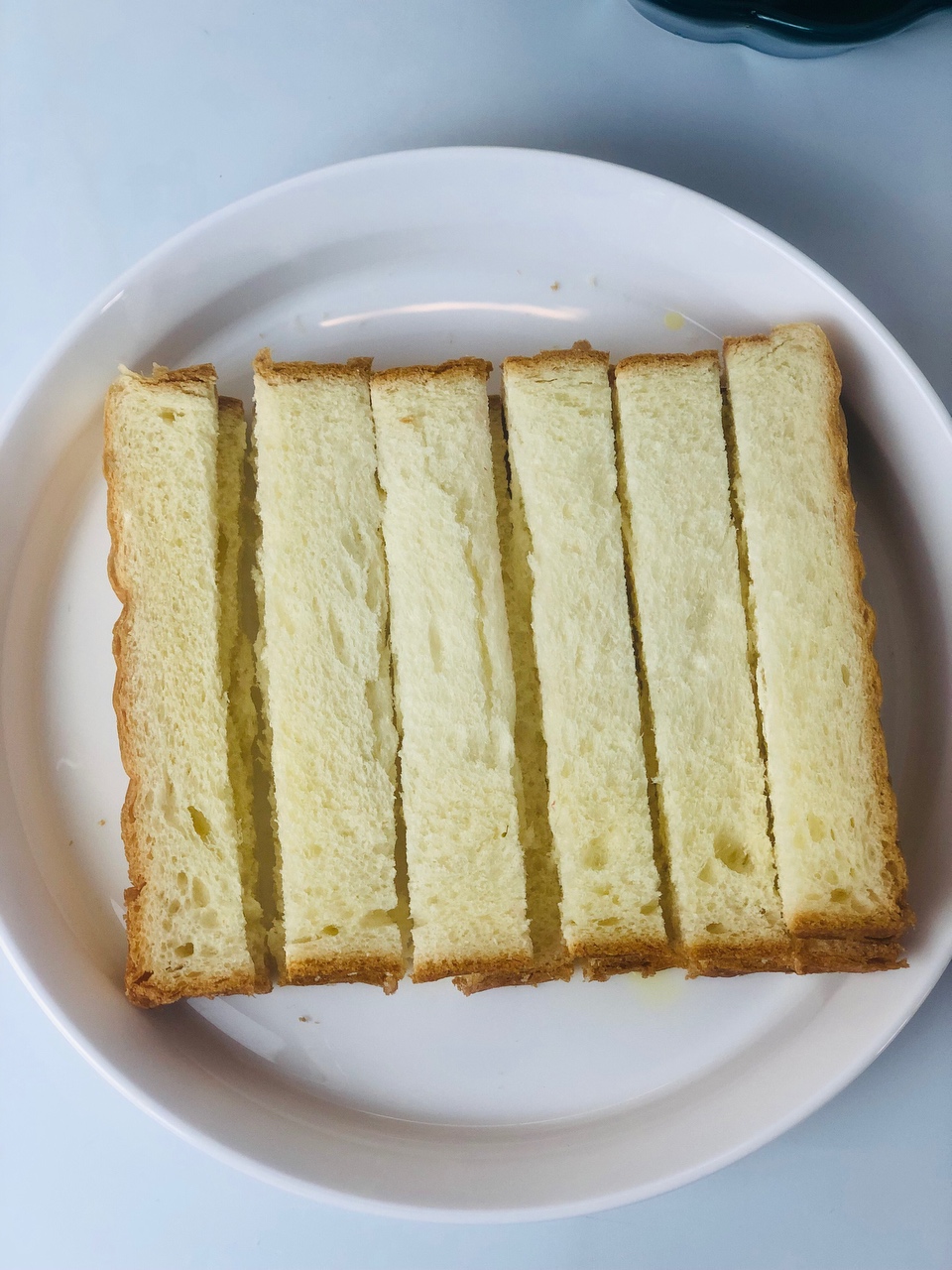 吃不完的面包片/这样做黄油蜂蜜面包条绝了的做法 步骤5