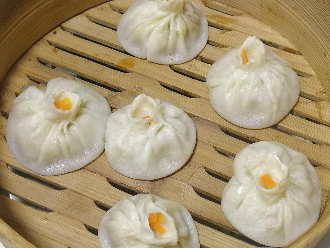 尽倾江海里赠饮天下人做的蟹黄小笼包