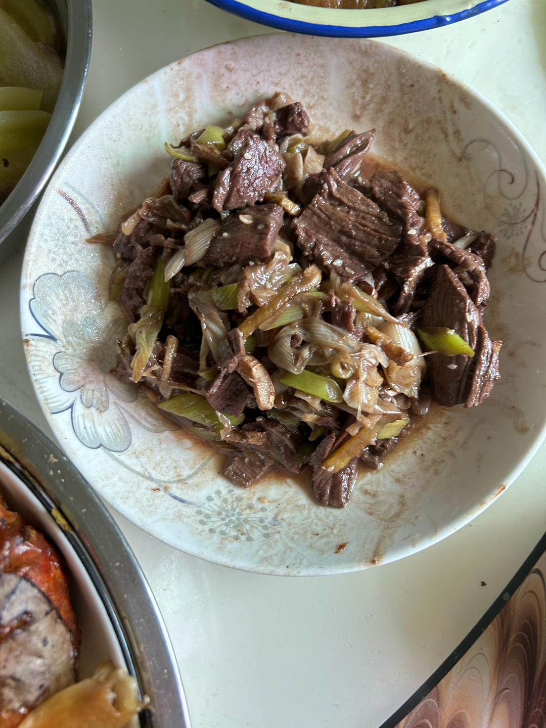 炒了20多年的葱爆羊肉