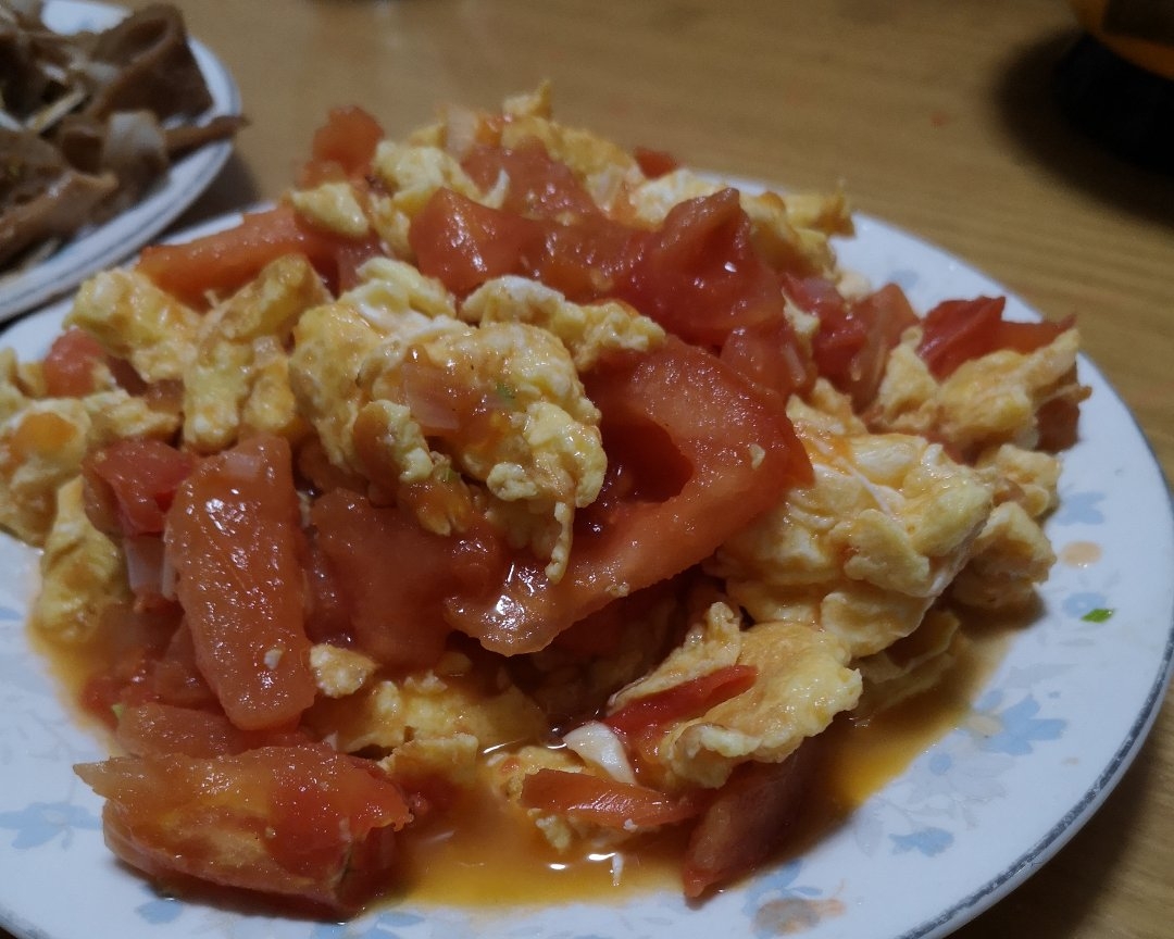 赛螃蟹西红柿炒鸡蛋的做法