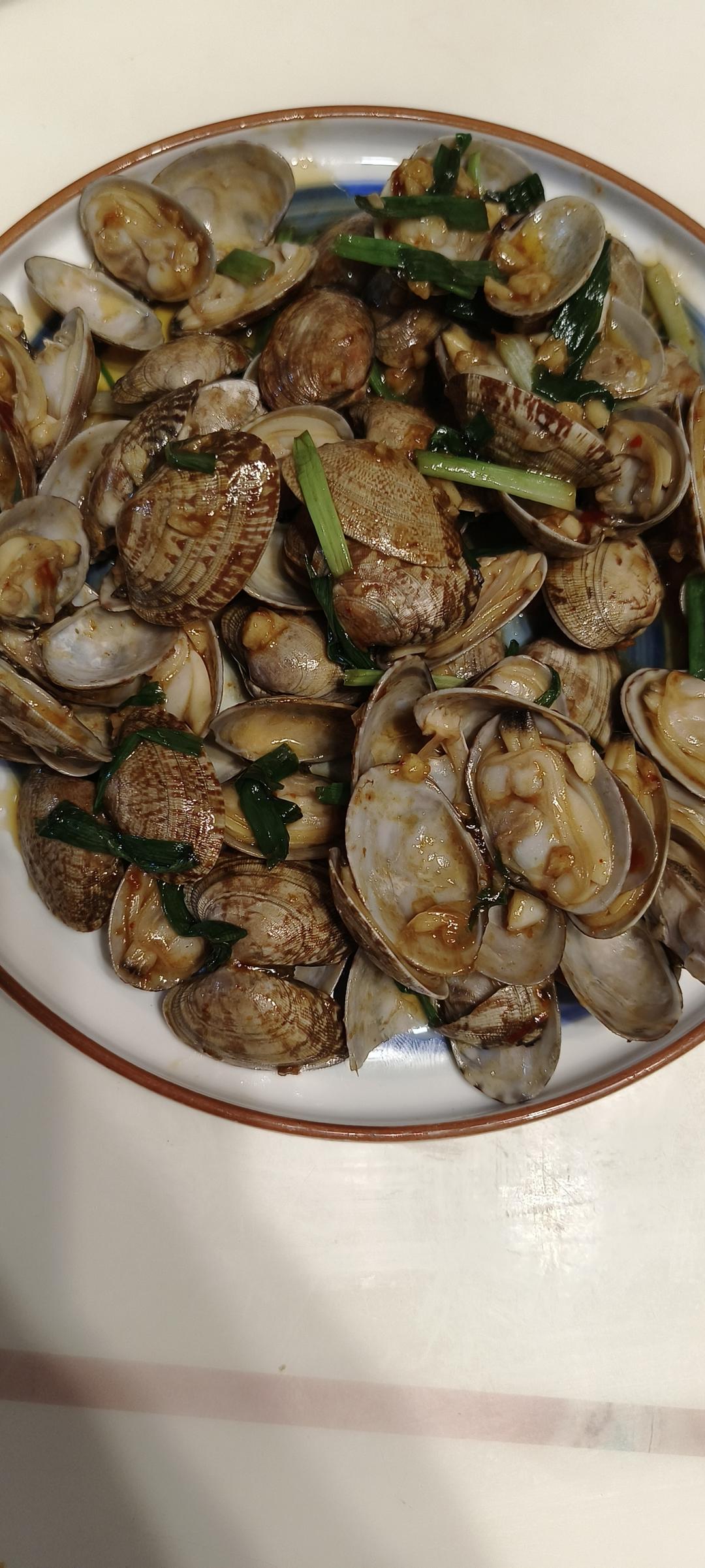 蒜香炒花甲