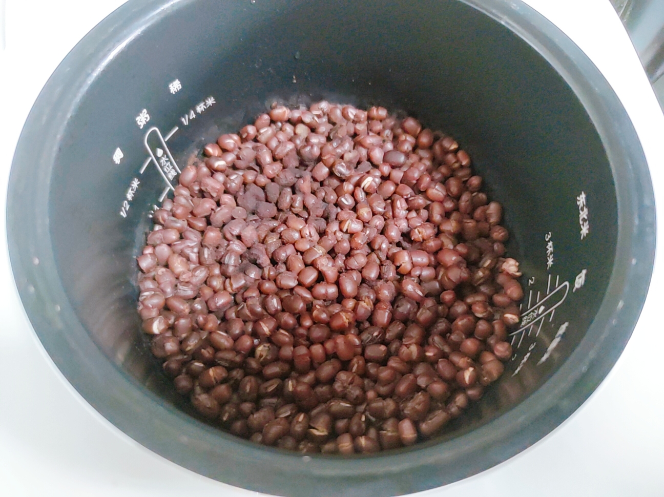百搭甜品的「蜜红豆」 电饭煲懒人版的做法 步骤6