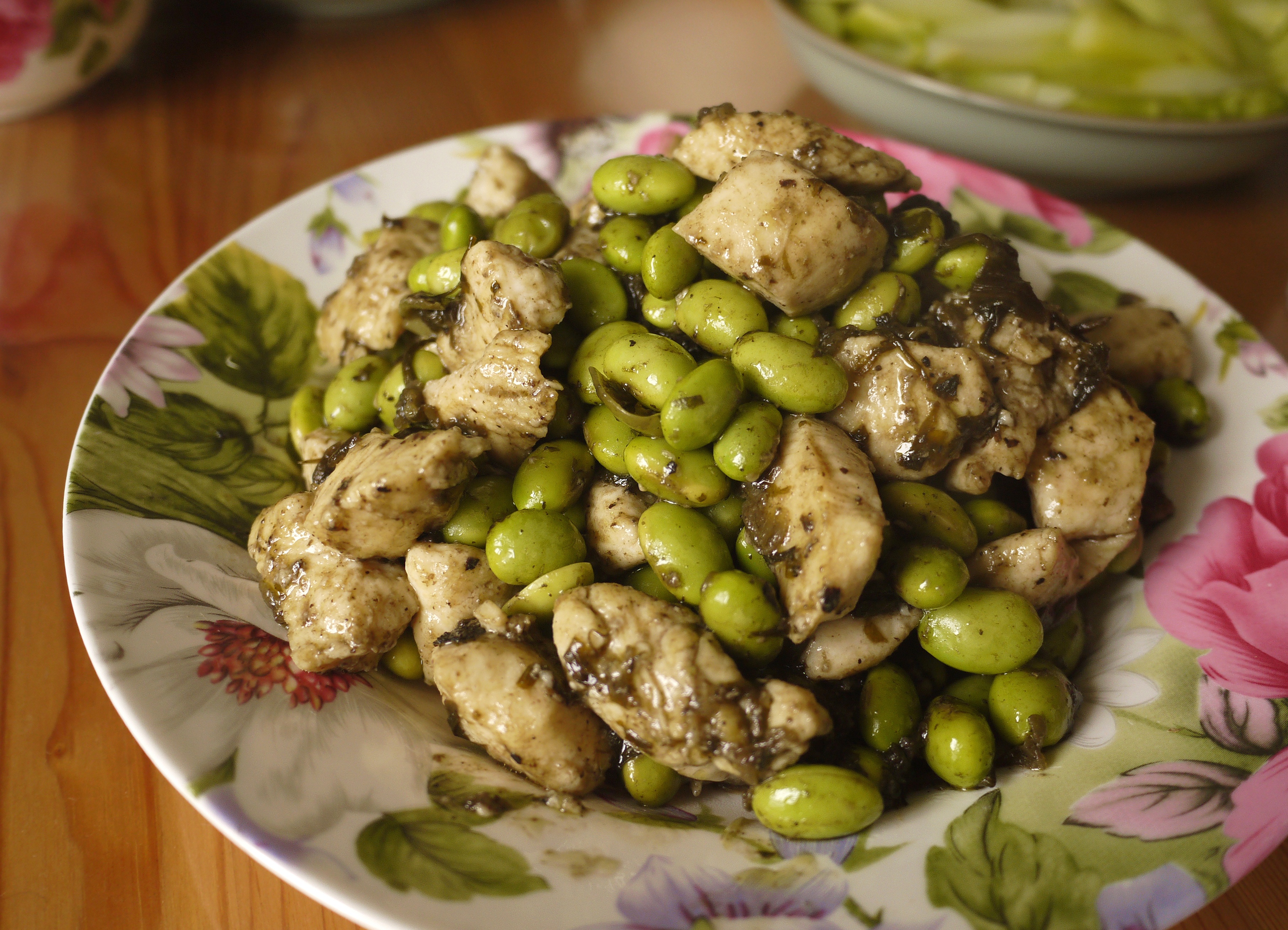 榄菜毛豆炒鸡丁