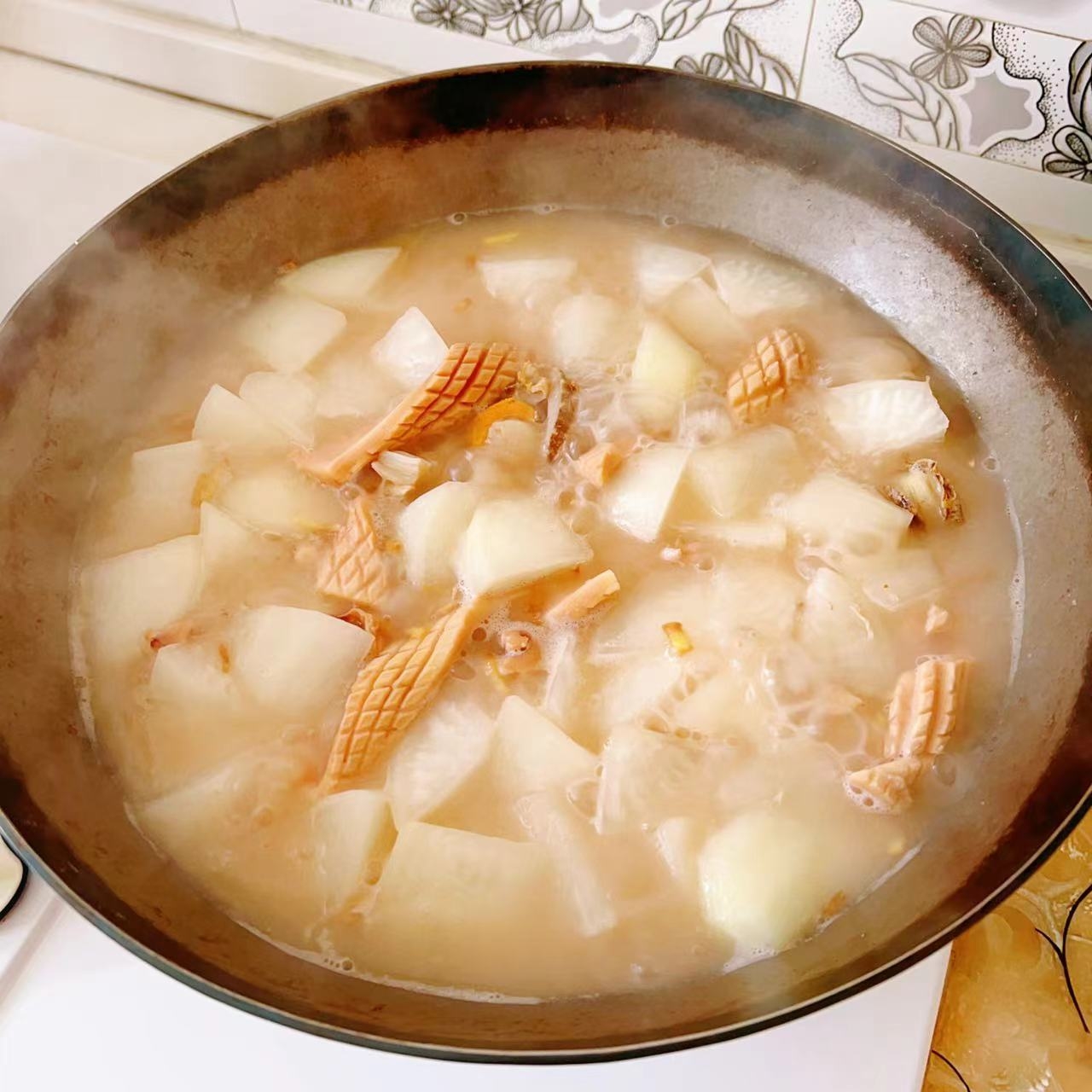 鱿鱼干扇贝海米(鲜甜萝卜汤)鲜掉眉毛的干货萝卜汤的做法 步骤12