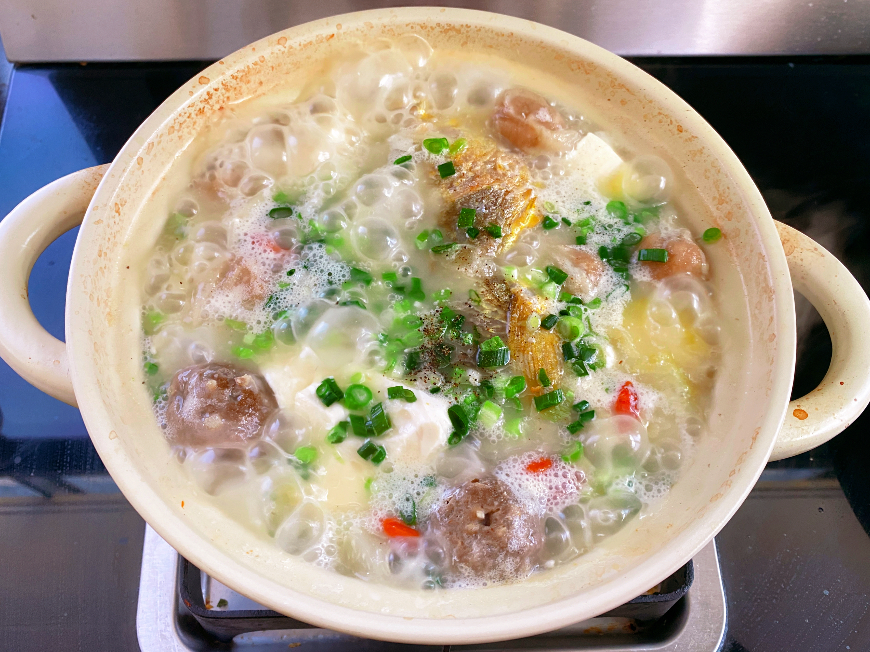 黄鱼酸菜豆腐汤的做法 步骤10