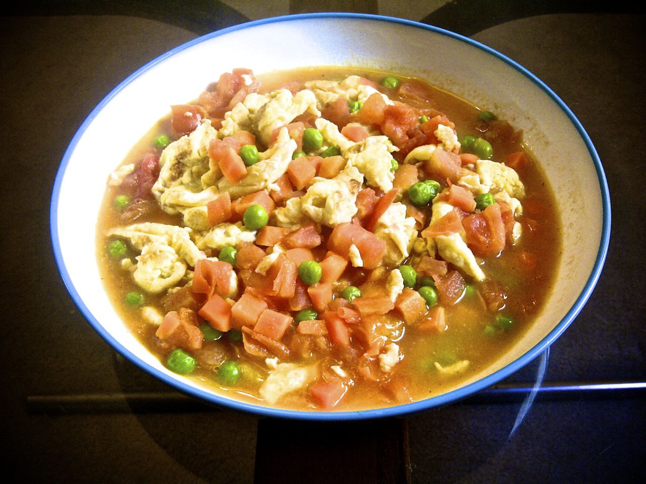 食味志做的西红柿炒鸡蛋豌豆