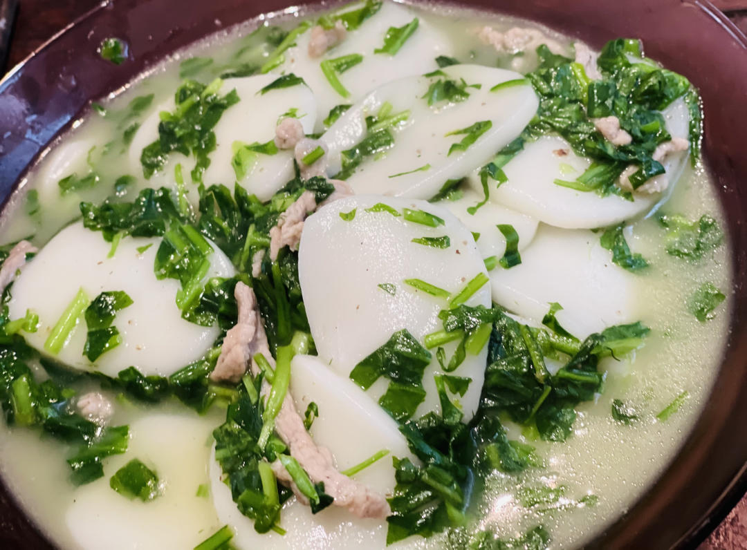 荠菜肉丝炒年糕