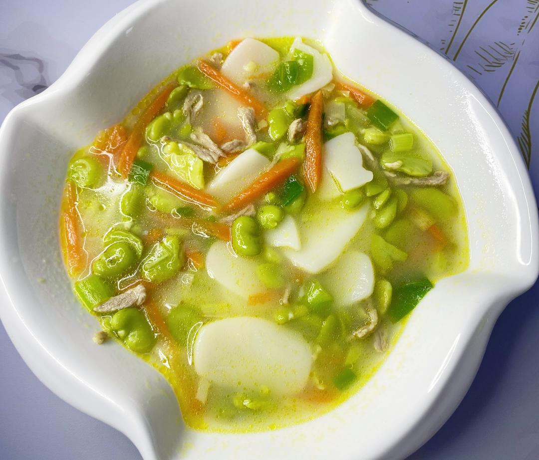 329 蚕豆肉丝煮年糕的做法