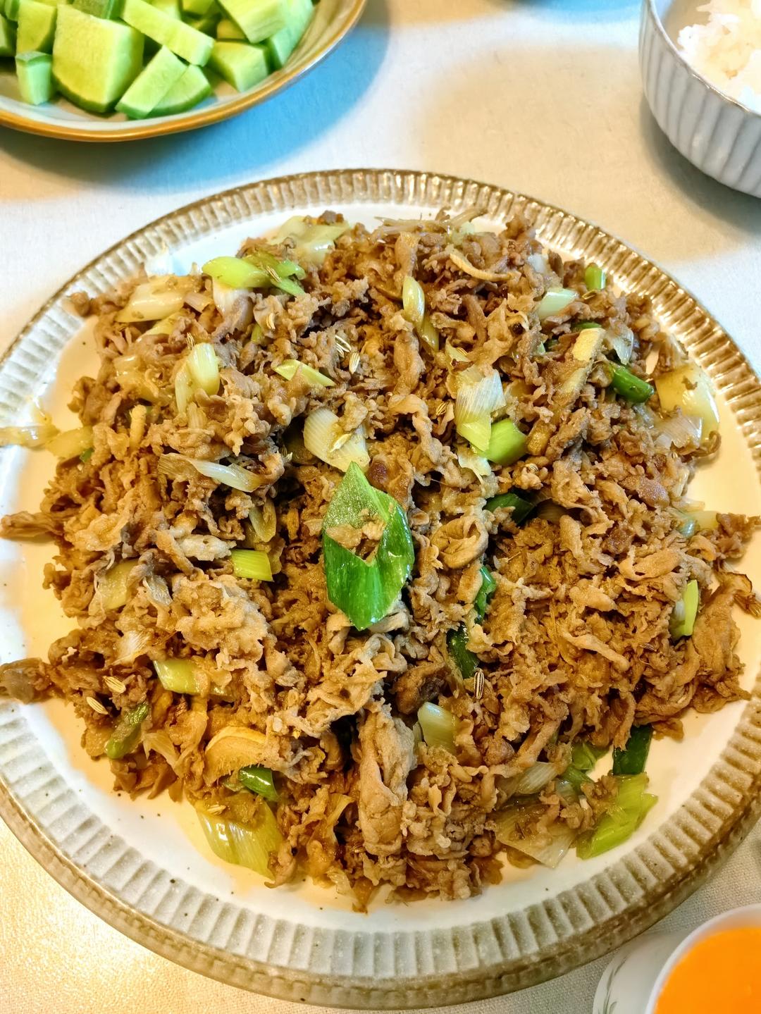 炒了20多年的葱爆羊肉