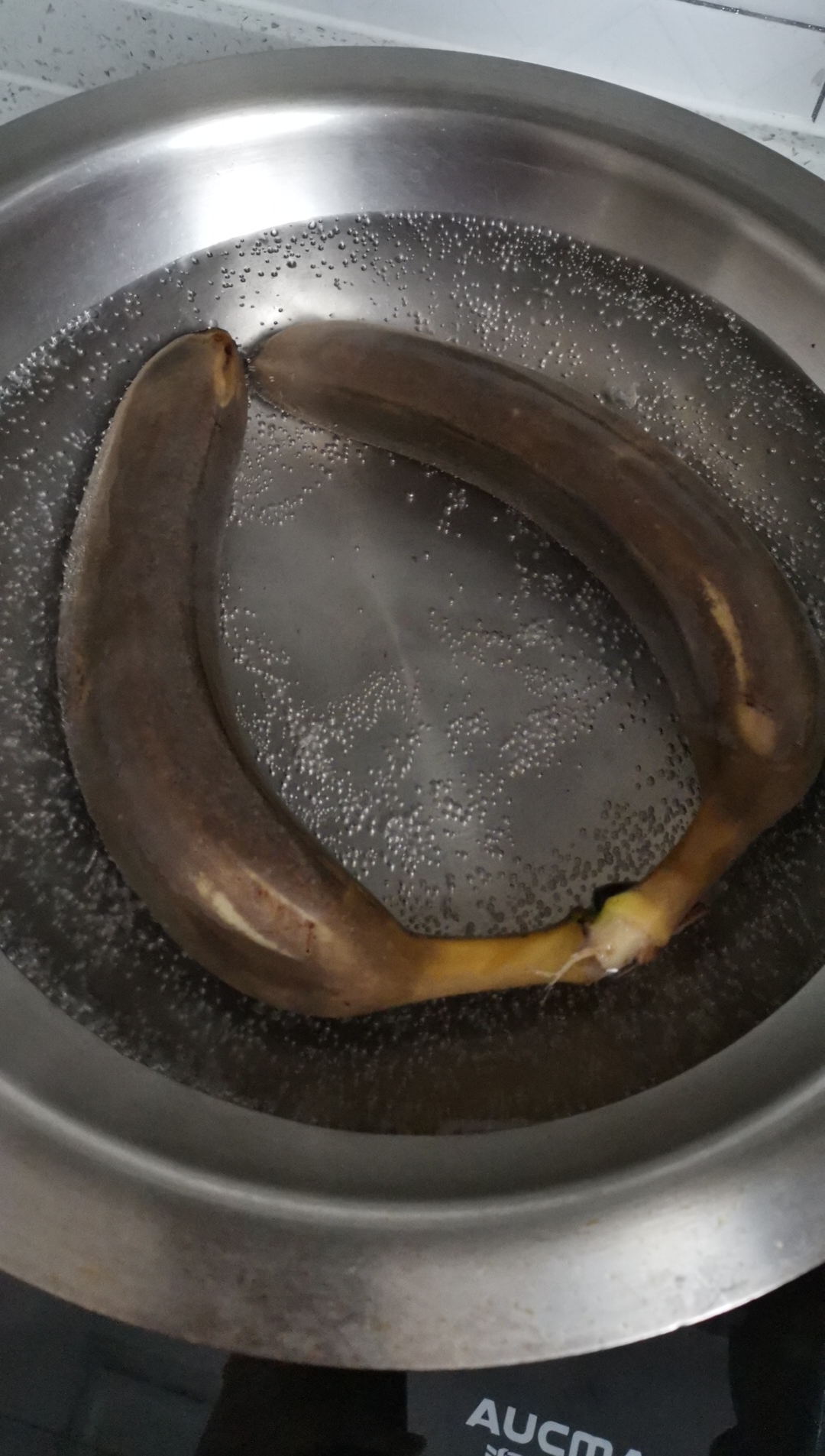 煮香蕉的做法 步骤2
