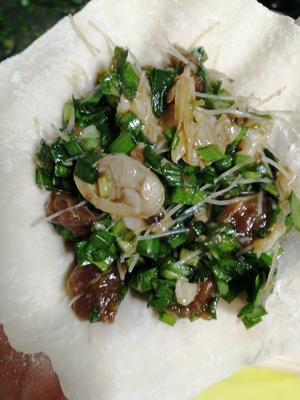 韭菜肉丁蛤蜊蒸饺的做法 步骤6