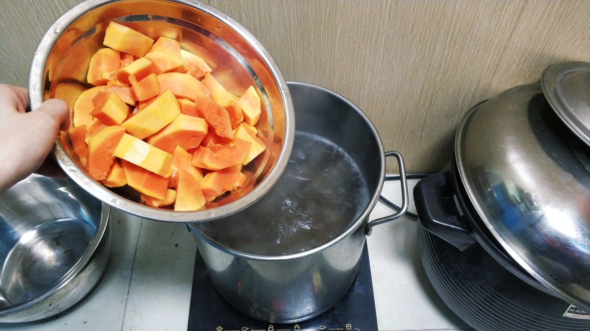 桃胶皂角米木瓜小米甜粥的做法 步骤5