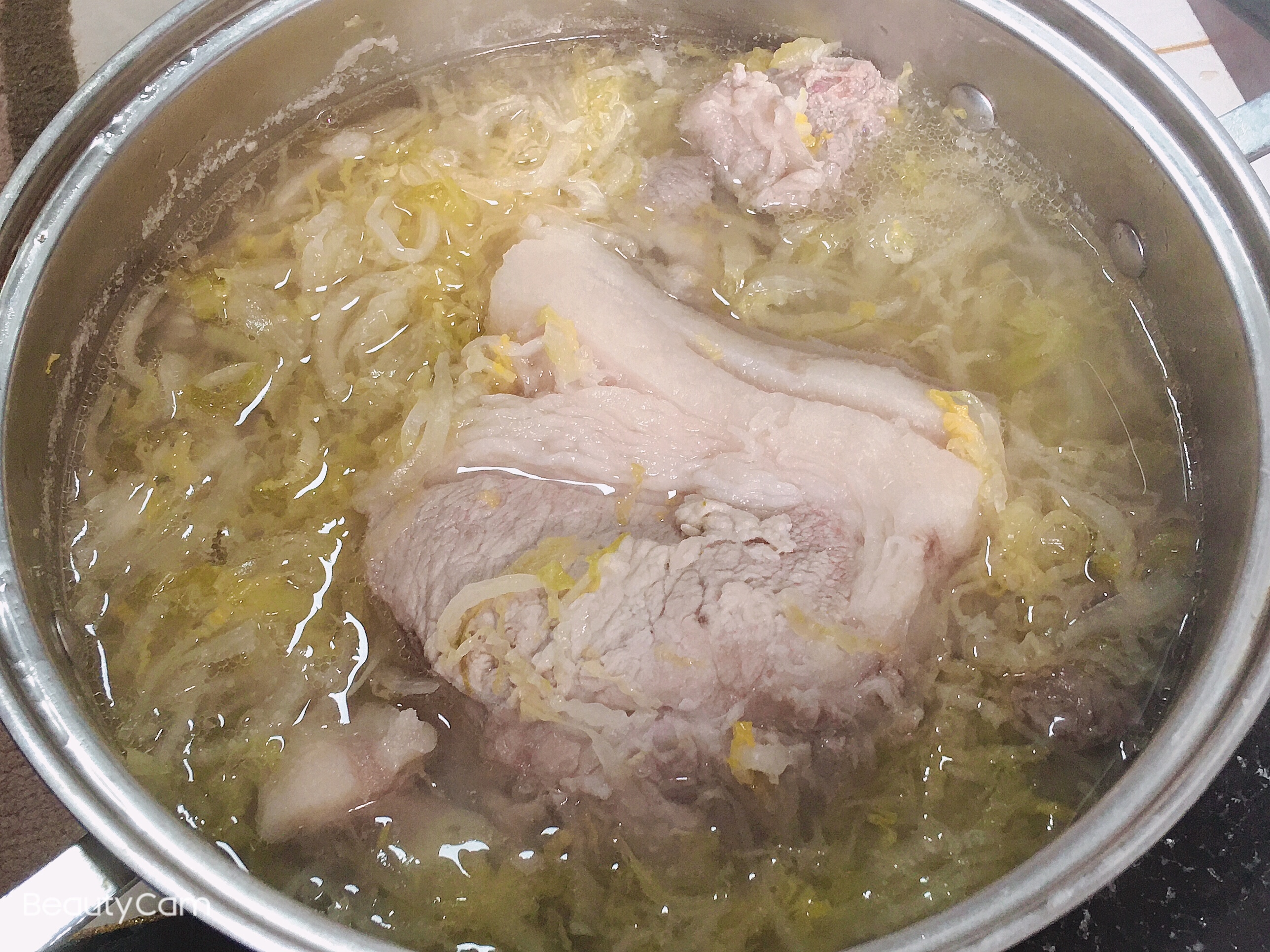 东北特色菜猪肉炖酸菜的做法 步骤4