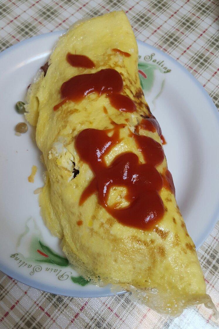 蛋包饭              米饭,鸡蛋,胡萝卜,火腿,玉米