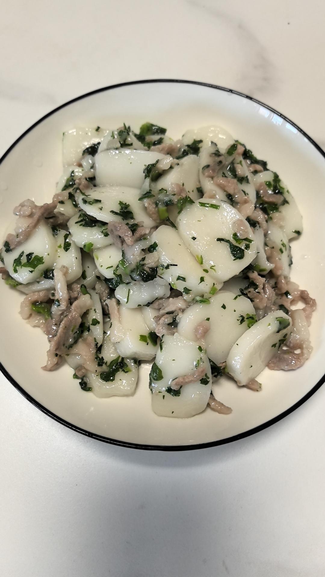 荠菜肉丝炒年糕