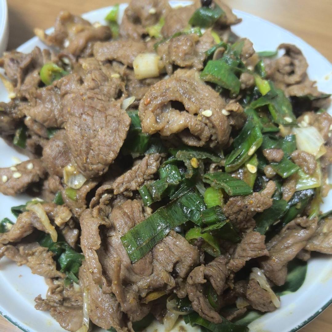 炒了20多年的葱爆羊肉