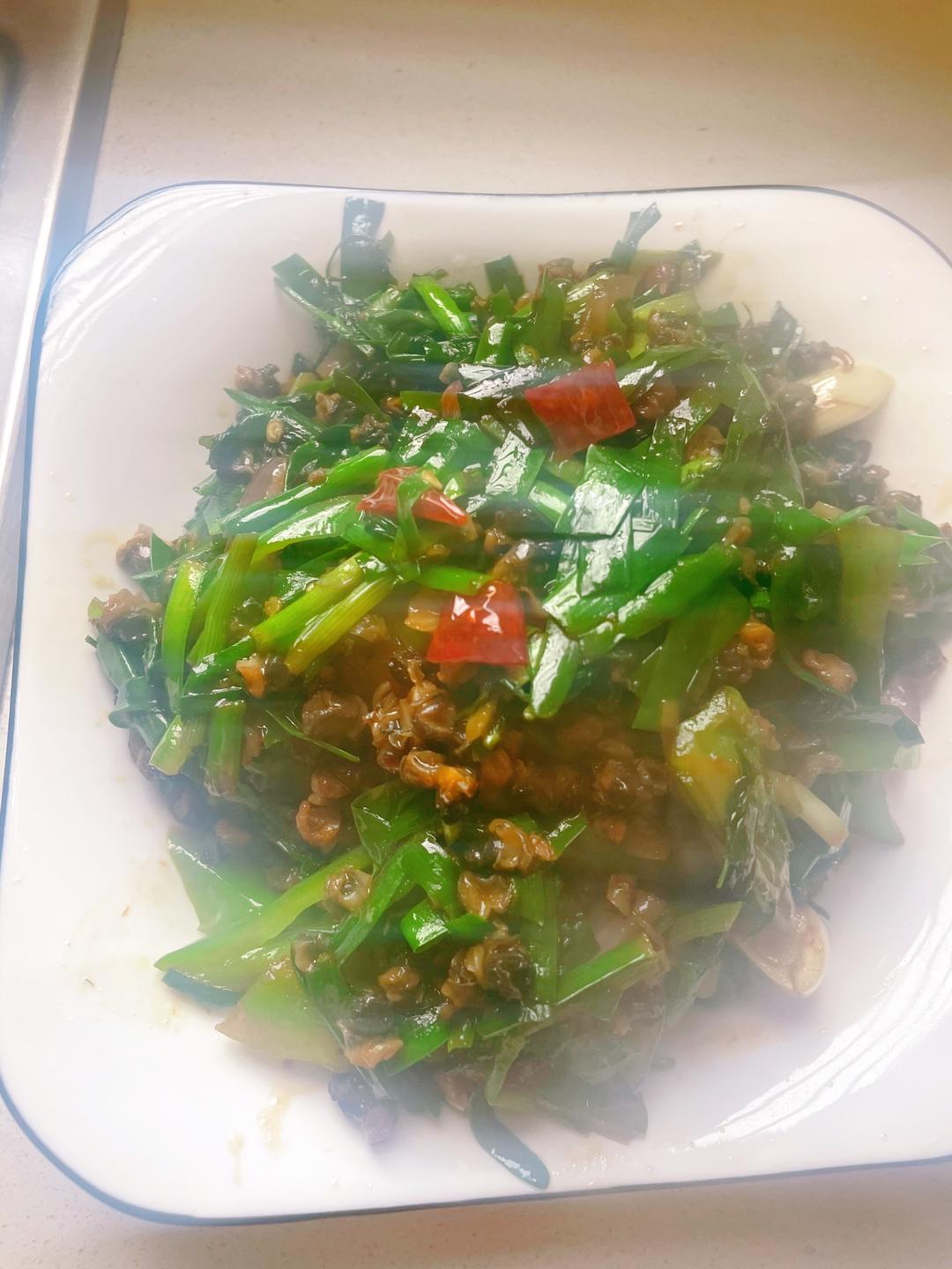 爆炒螺丝肉韭菜