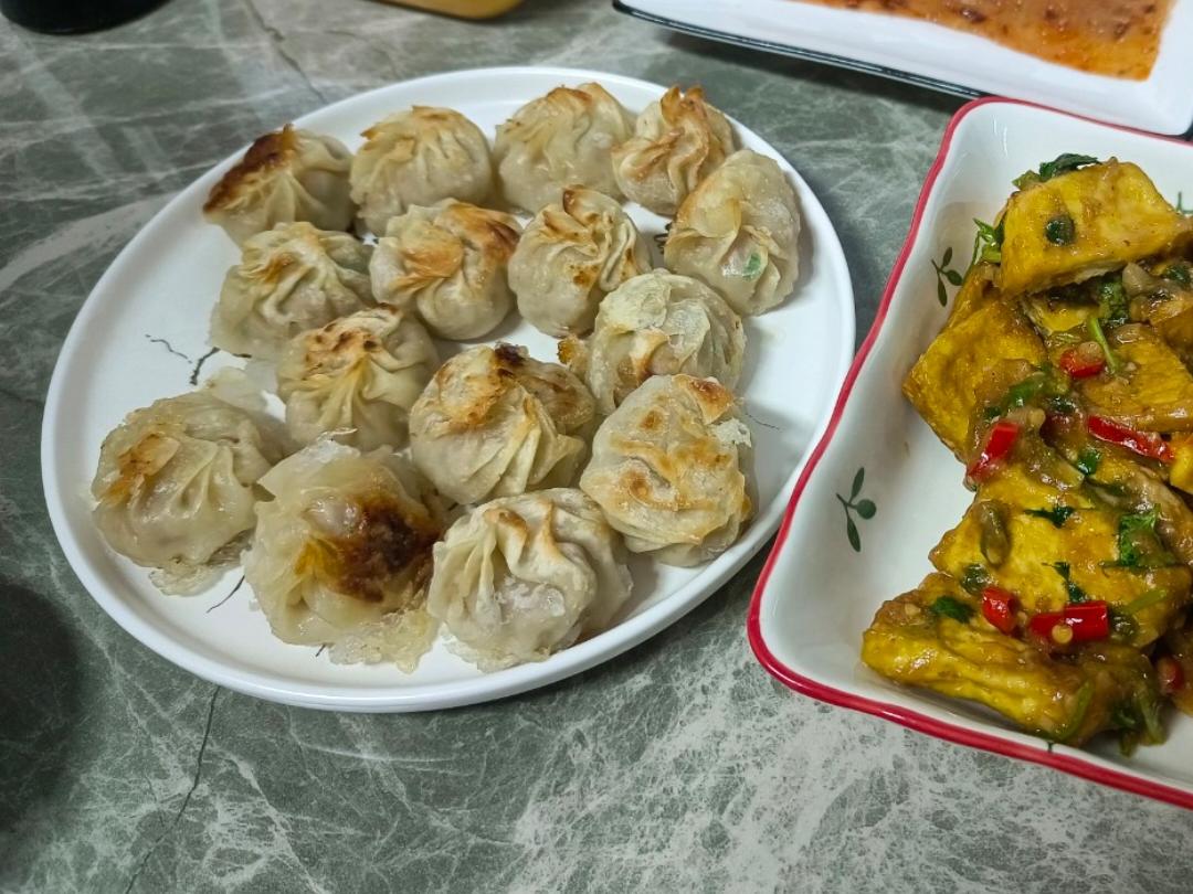 不揉面的--拇指生煎包