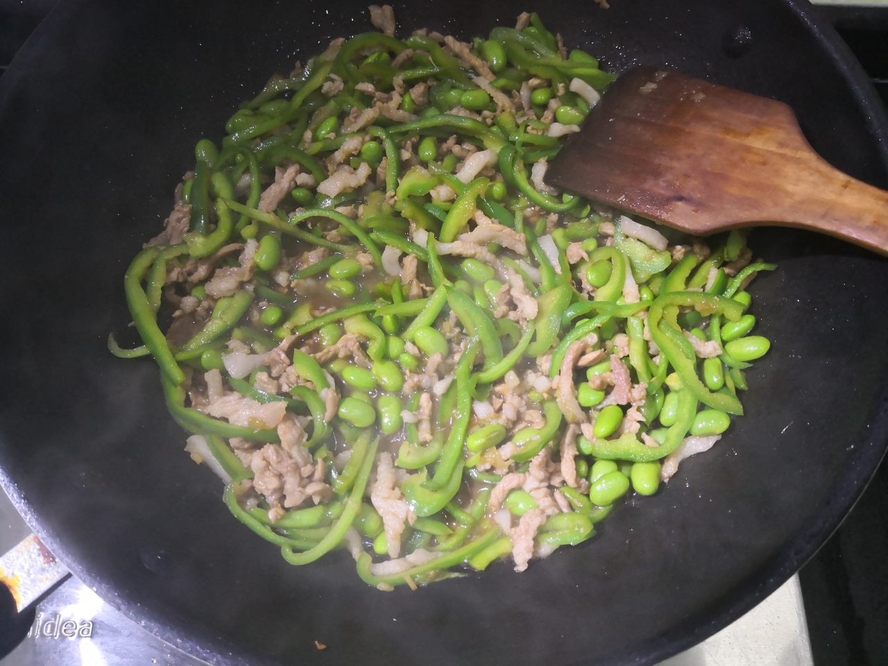 青椒毛豆炒肉丝的做法