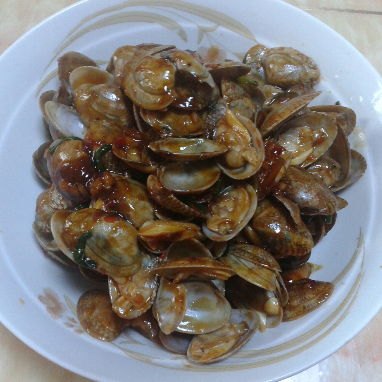 蒜香炒花甲