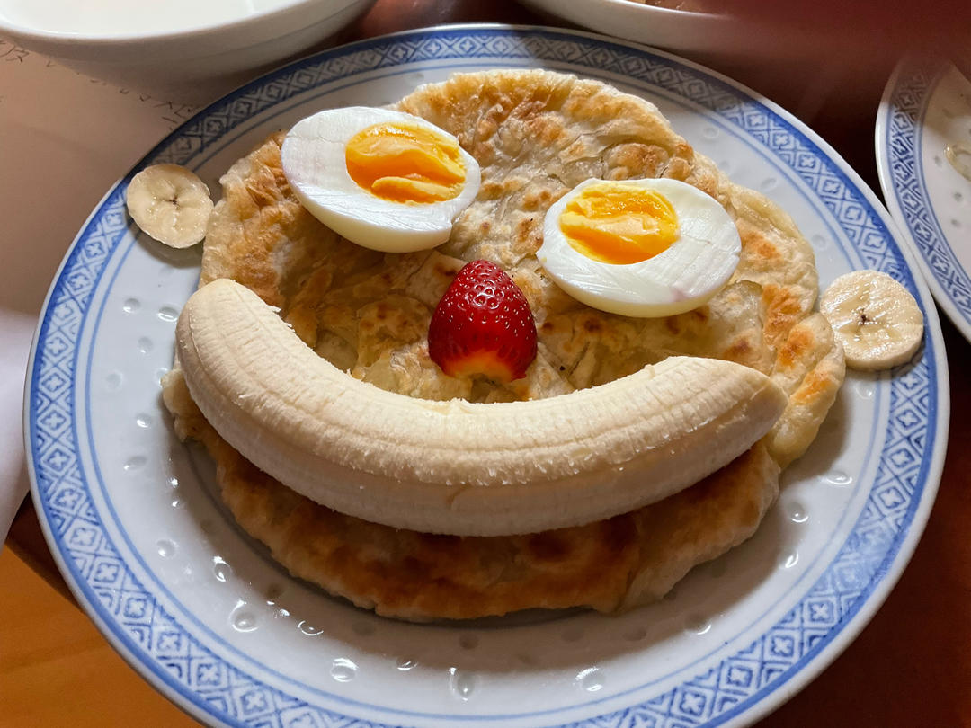 大饼做成人脸型你见过吗？