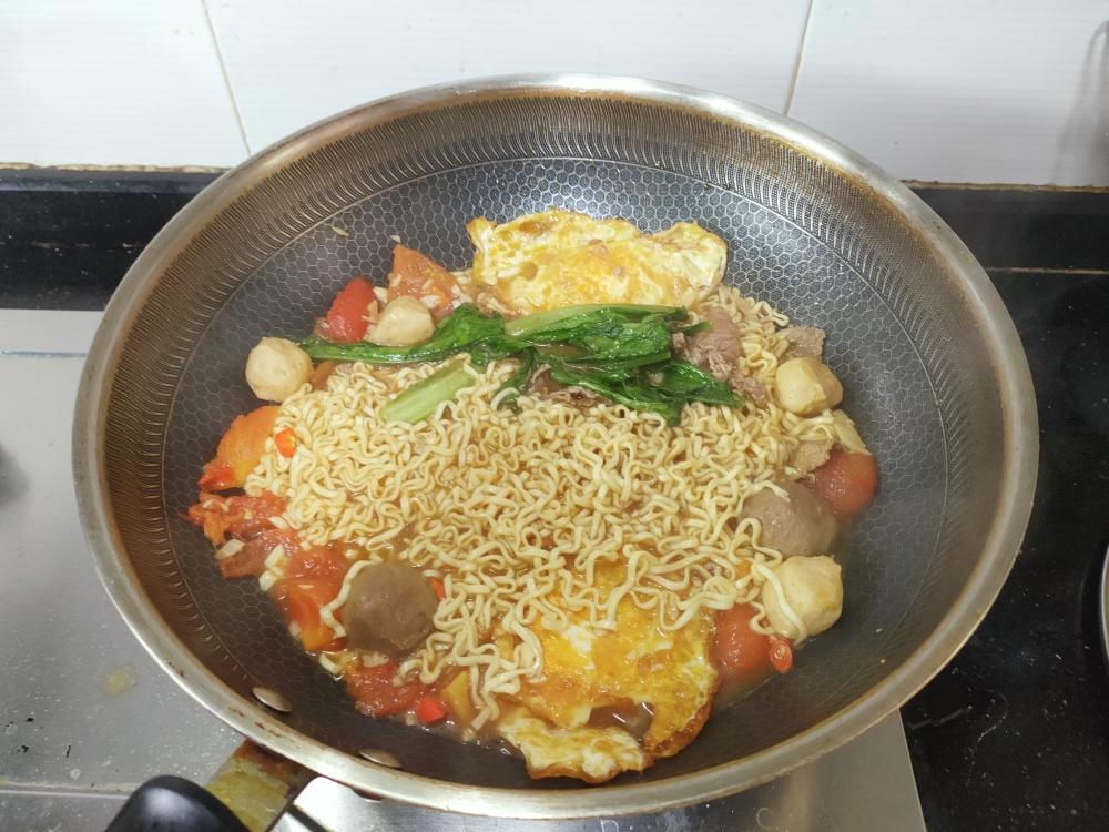 番茄鸡蛋焖面的做法