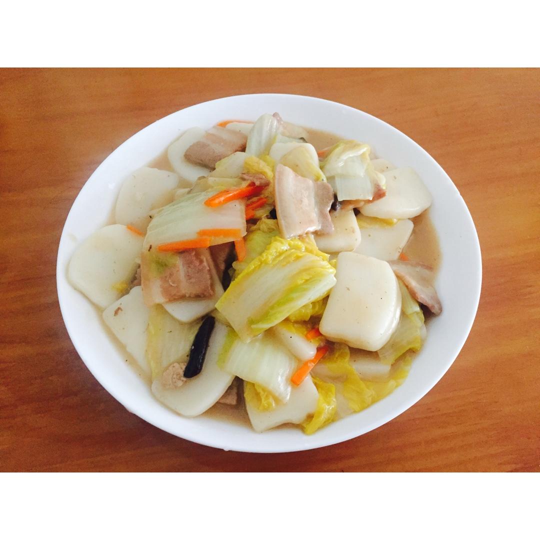 汐往潮去做的黄芽菜肉丝炒年糕