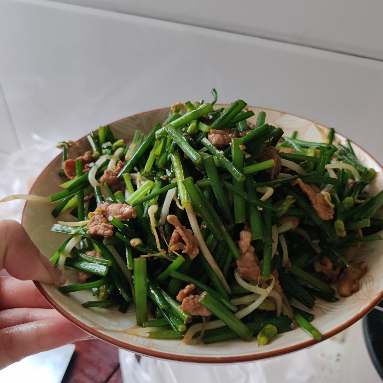 韭菜苔炒肉的做法 步骤5