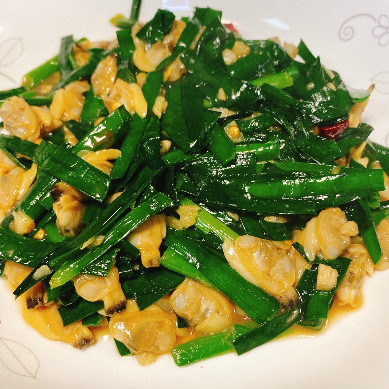 韭菜炒花甲肉的做法