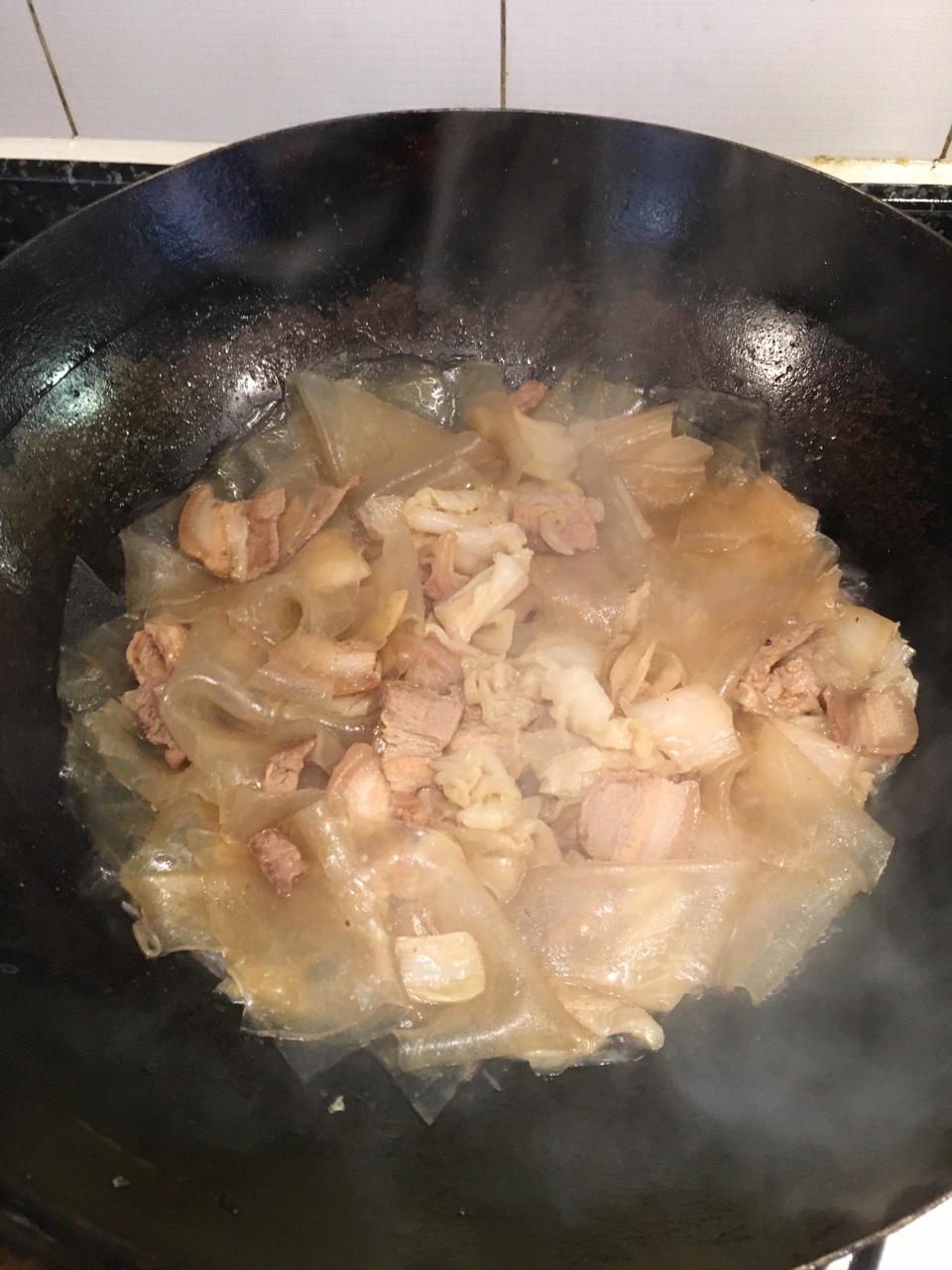 酸菜粉皮炖白肉的做法 步骤16