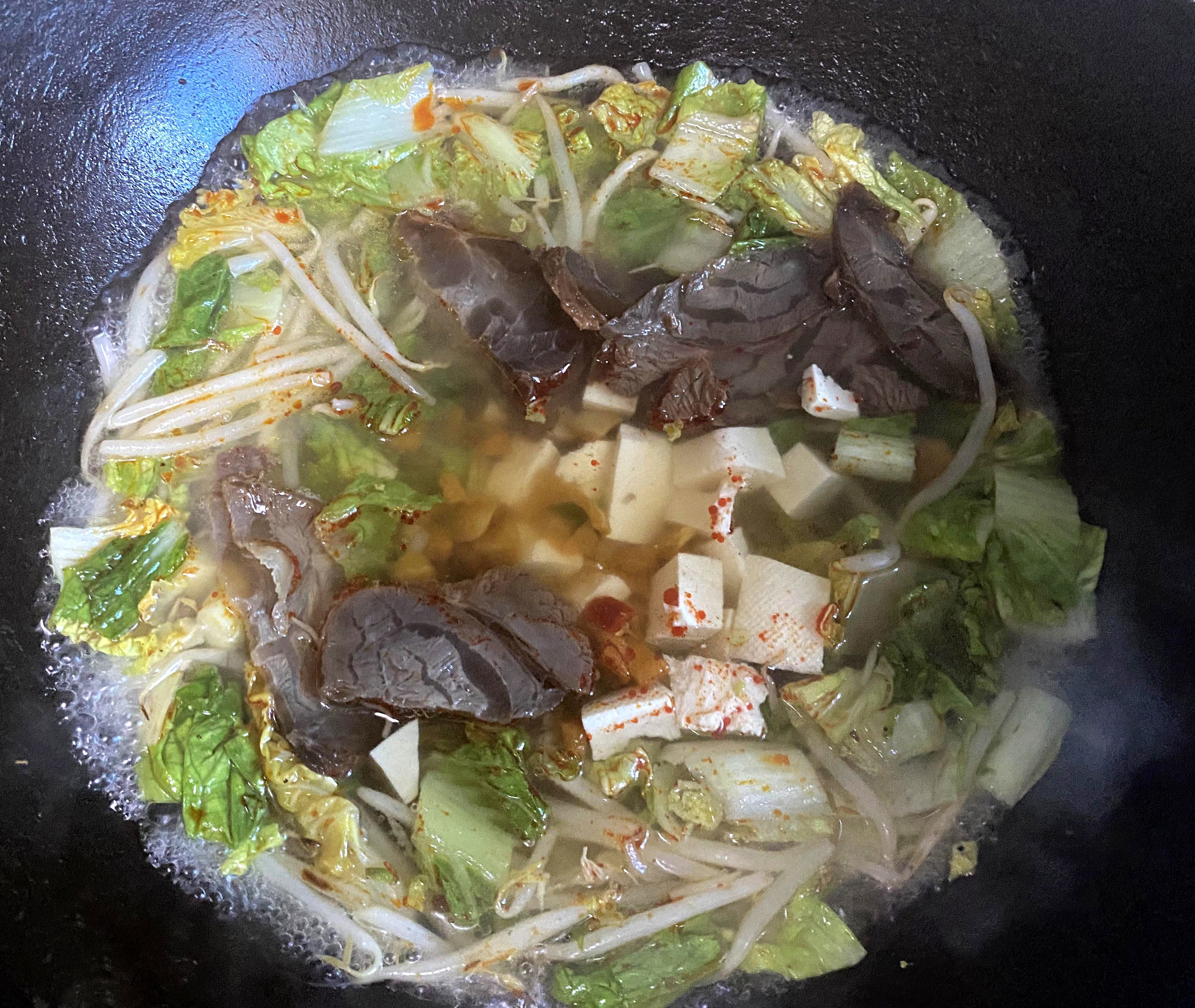 青菜豆腐牛肉汤的做法 步骤3