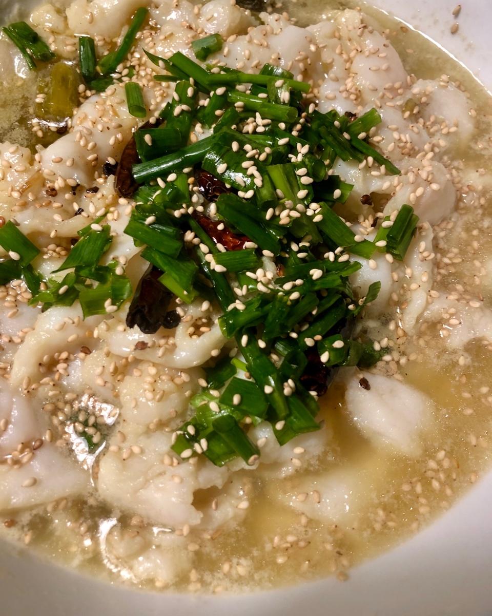 金针菇巴沙鱼柳酸菜鱼（宴美国客菜）