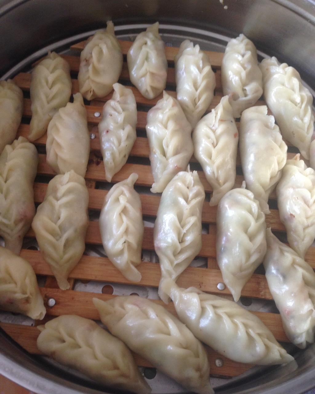 冬节鸽（海丰小吃。包菜+红萝卜+蘑菇+花生+鱿鱼+虾仁+火腿馅的饺子）