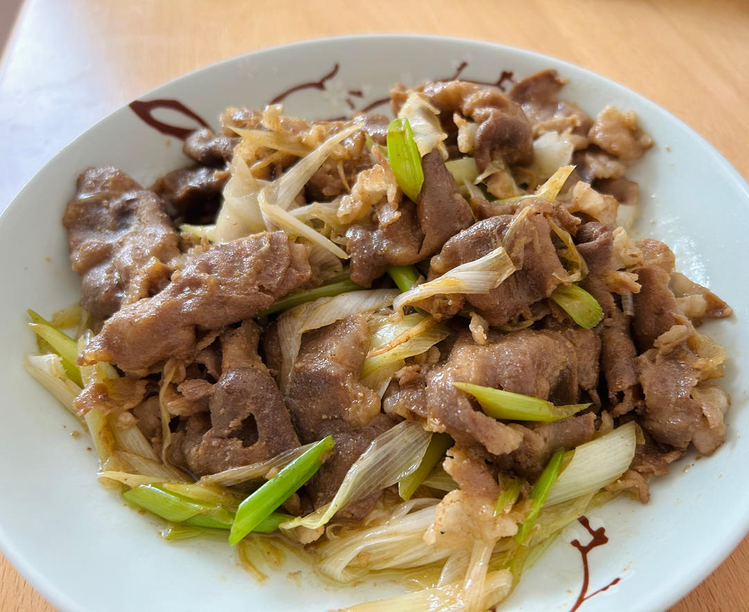 炒了20多年的葱爆羊肉