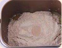 椰香葡萄干吐司---面包机版的做法 步骤3