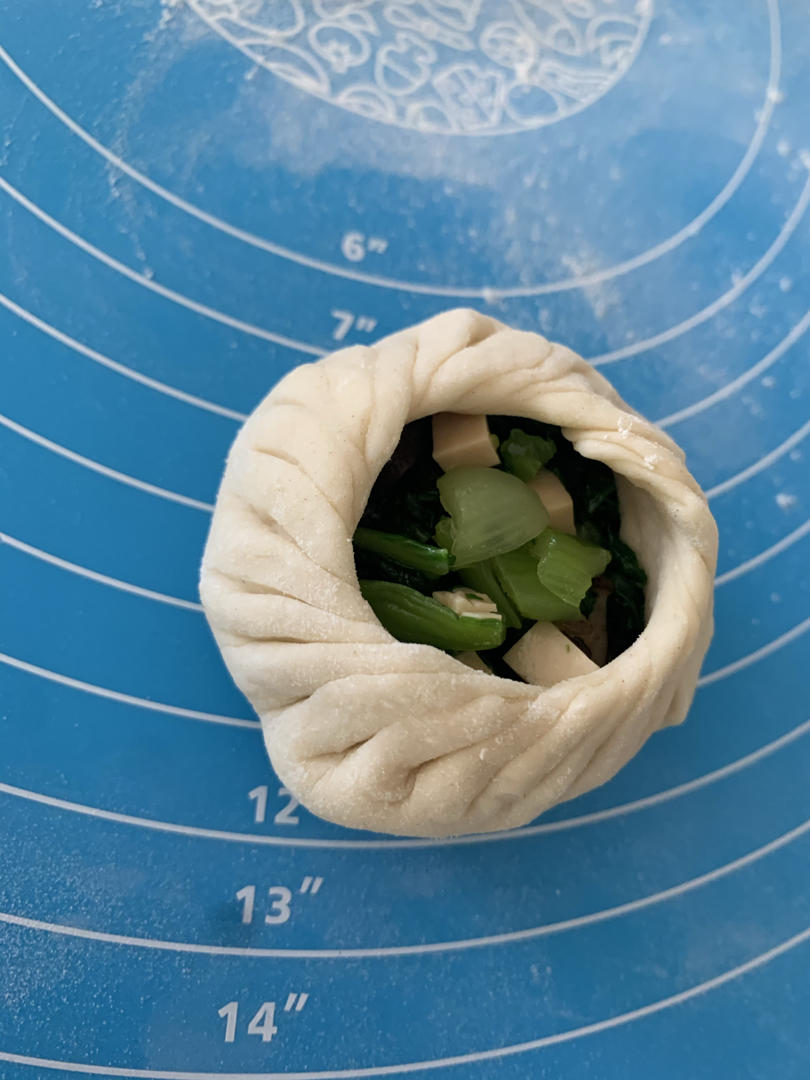 sakuramomokolina做的梅干菜柳叶包蔬菜提褶包