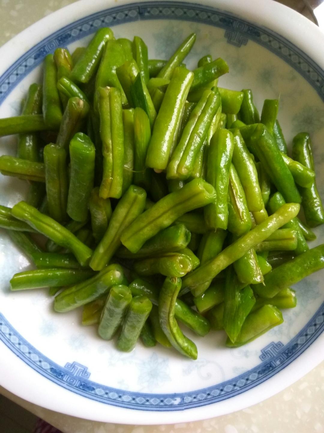 这么近/那么远做的素炒豆角