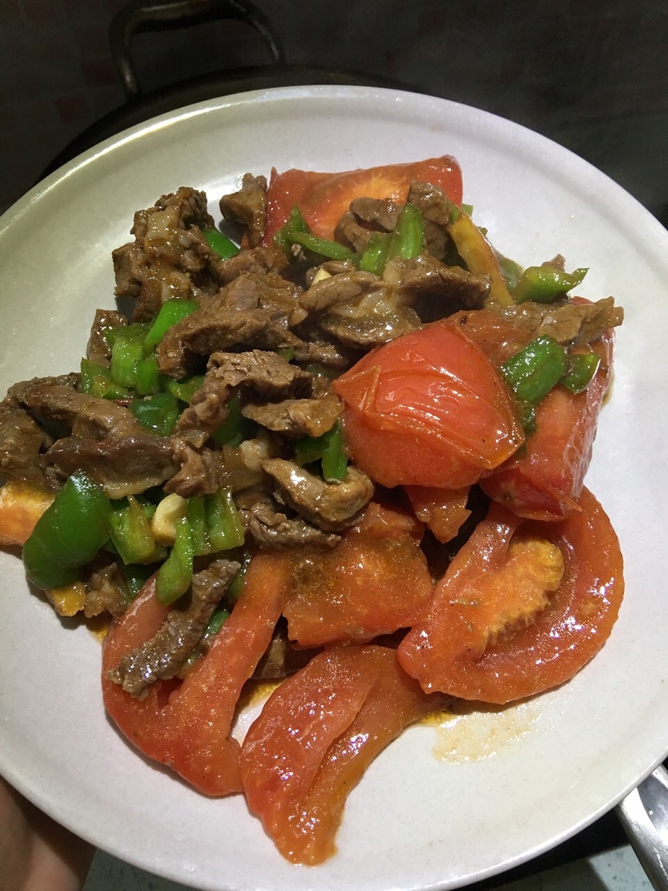 青椒牛肉炒西红柿的做法