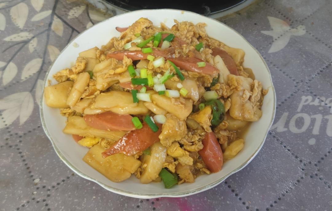 鸡蛋炒年糕                                    心里top1️⃣好吃的菜(简单快手)