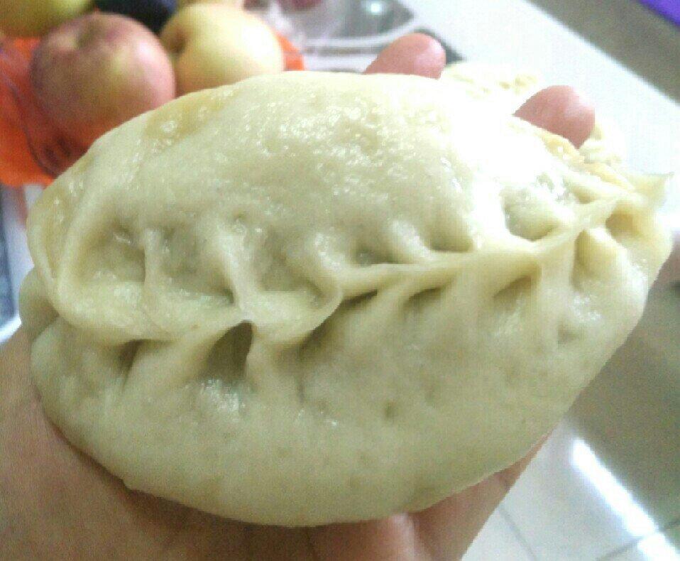 弯柳叶包子包法