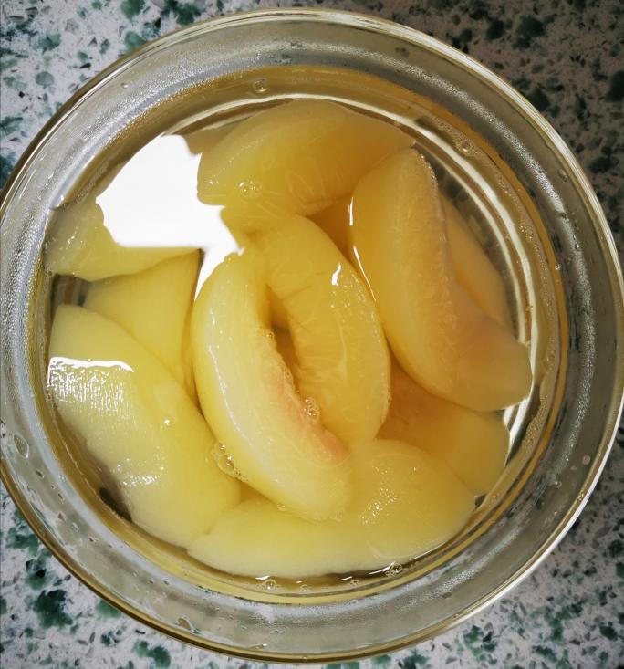 家庭自制糖水桃罐头