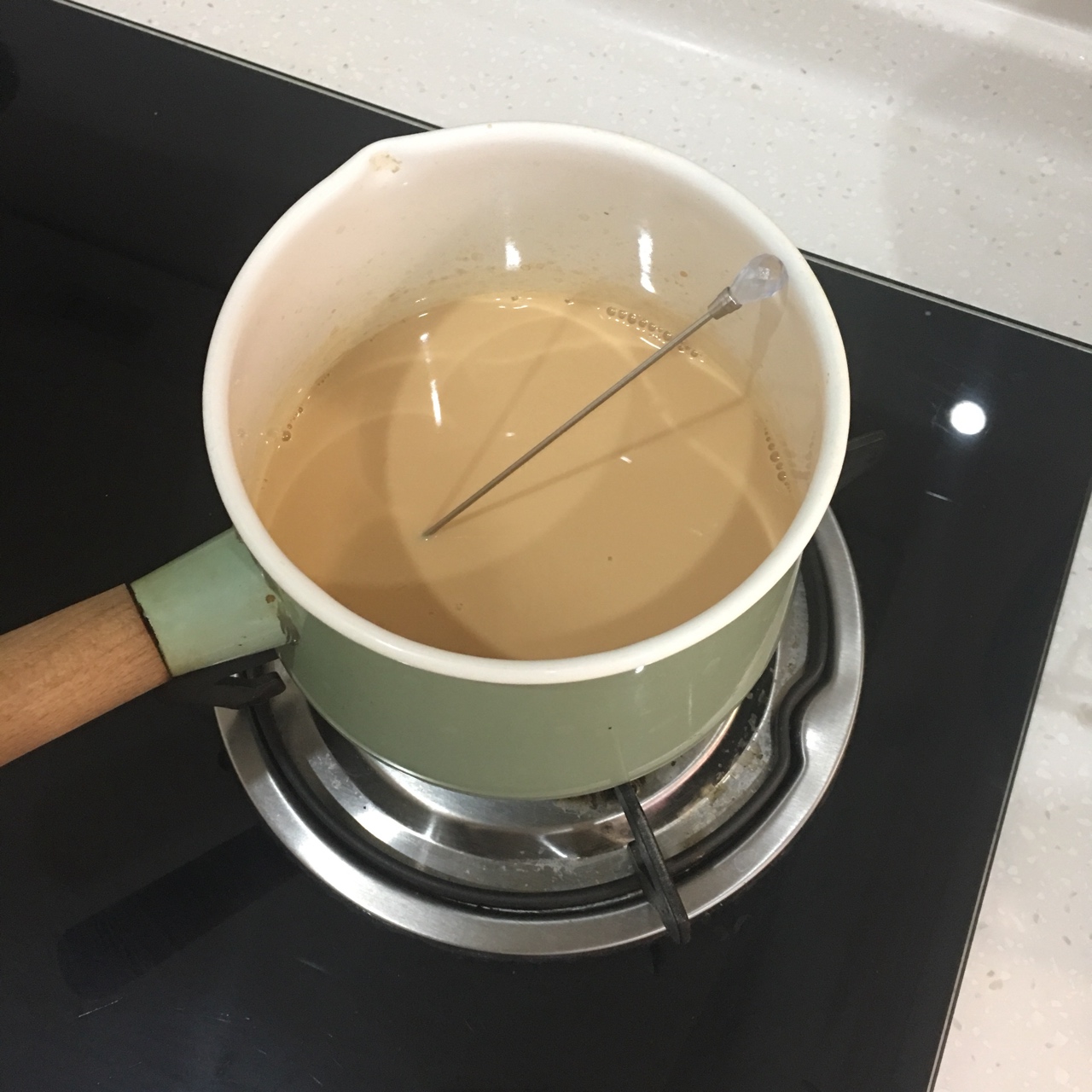 超快手锅煮奶茶的做法 步骤5