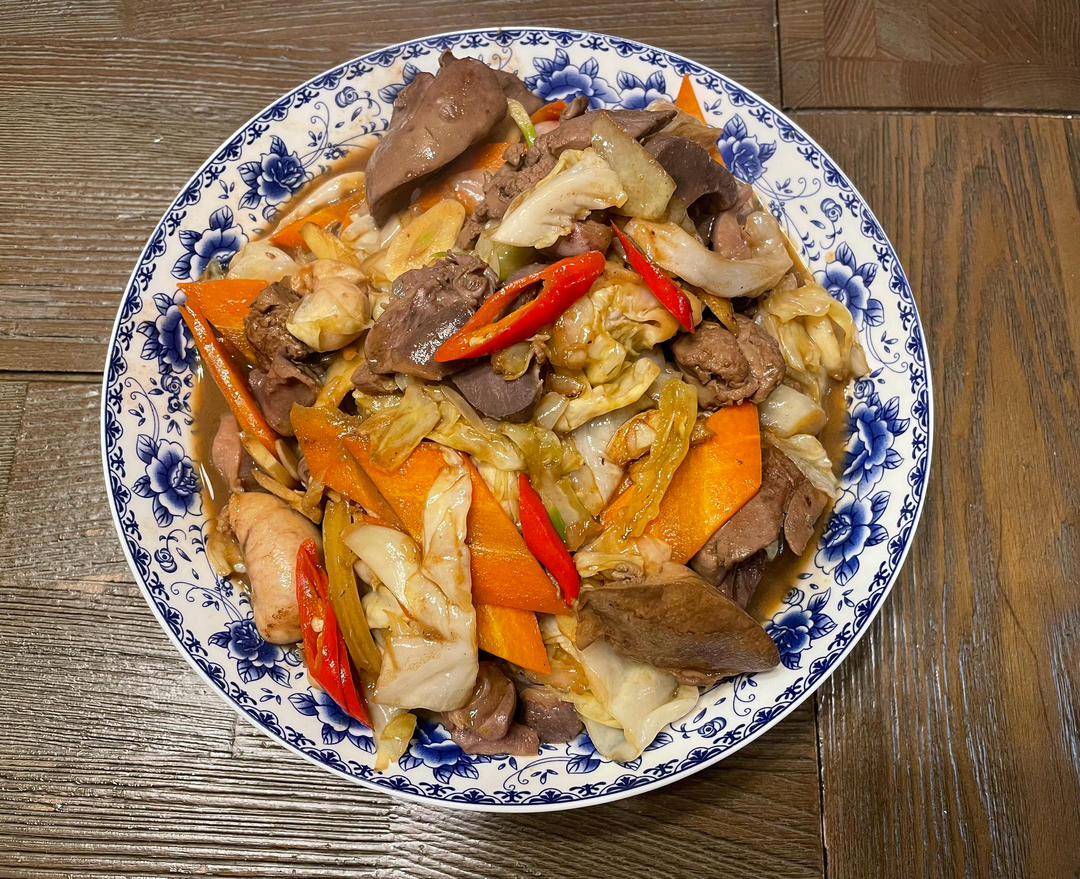 酸辣泡菜炒鸡杂的做法