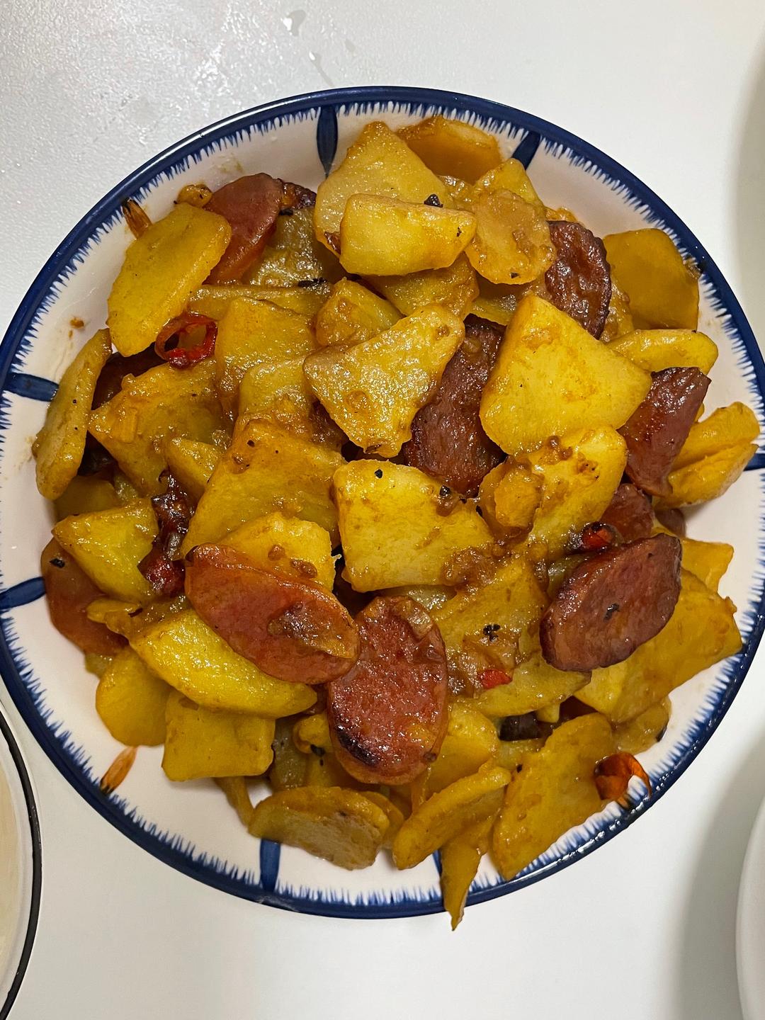 家常土豆炒腊肠